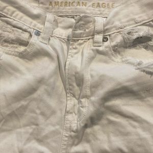 American Eagle white ripped mom jeans